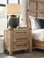 Ridgester - Three Drawer Night Stand - Light Brown
