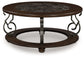 Frallyn - Round Cocktail Table - Dark Brown
