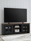 Wildenauer - XL TV Stand With Fireplace Option - Brown / Black