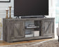 Wynnlow - 63" TV Stand With Glass/Stone Fireplace Insert - Gray