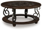 Frallyn - Round Cocktail Table - Dark Brown