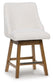 Cabalynn - Upholstered Swivel Barstool (Set of 2) - Oatmeal / Light Brown