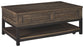 Johurst - LIFT TOP COCKTAIL TABLE - Grayish Brown