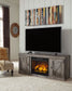 Wynnlow - TV Stand With Faux Firebrick Fireplace Insert - Gray